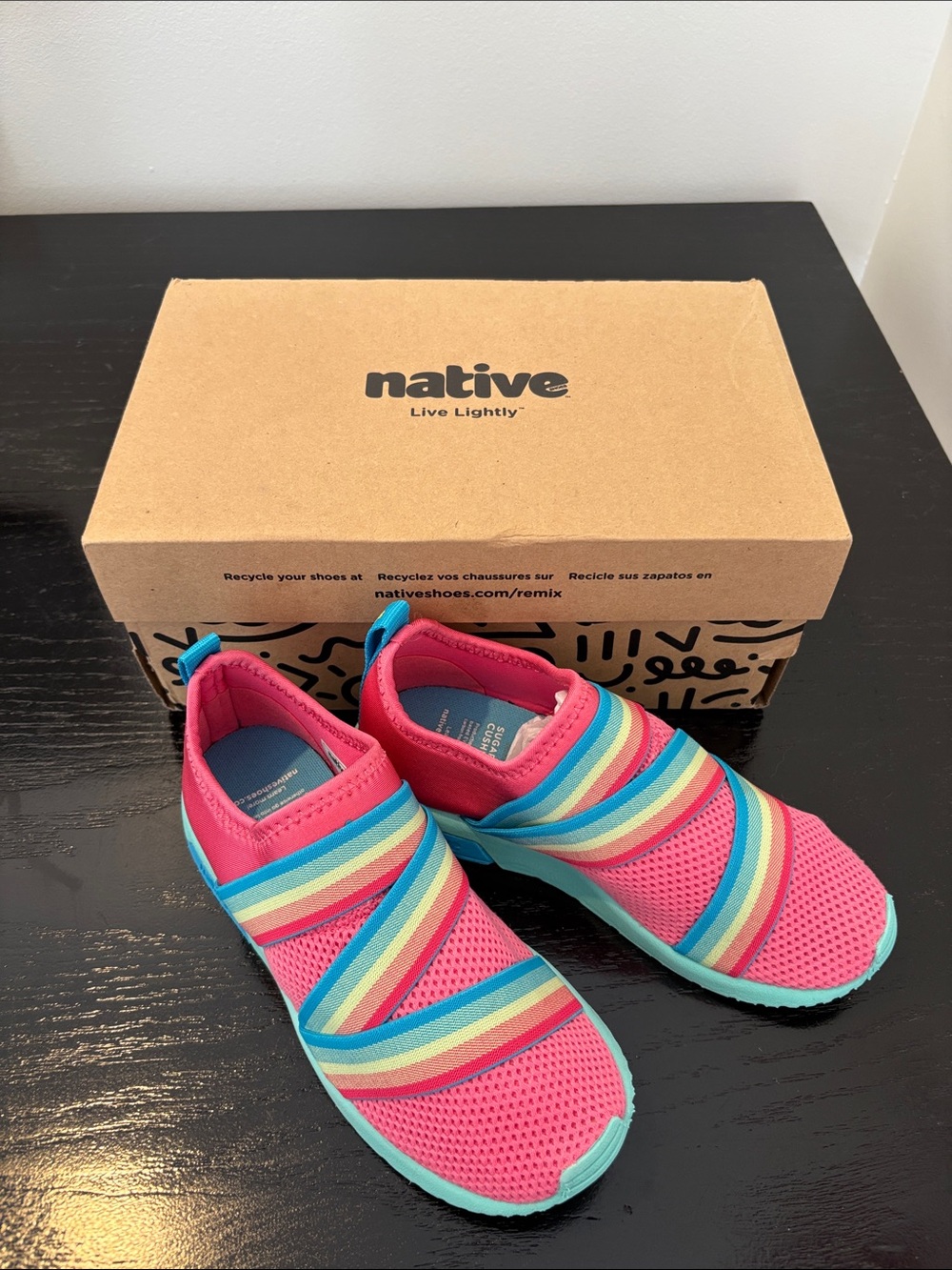Native Phoenix Sugarlite Slip-On Sneakers in Pink with Rainbow Stripes